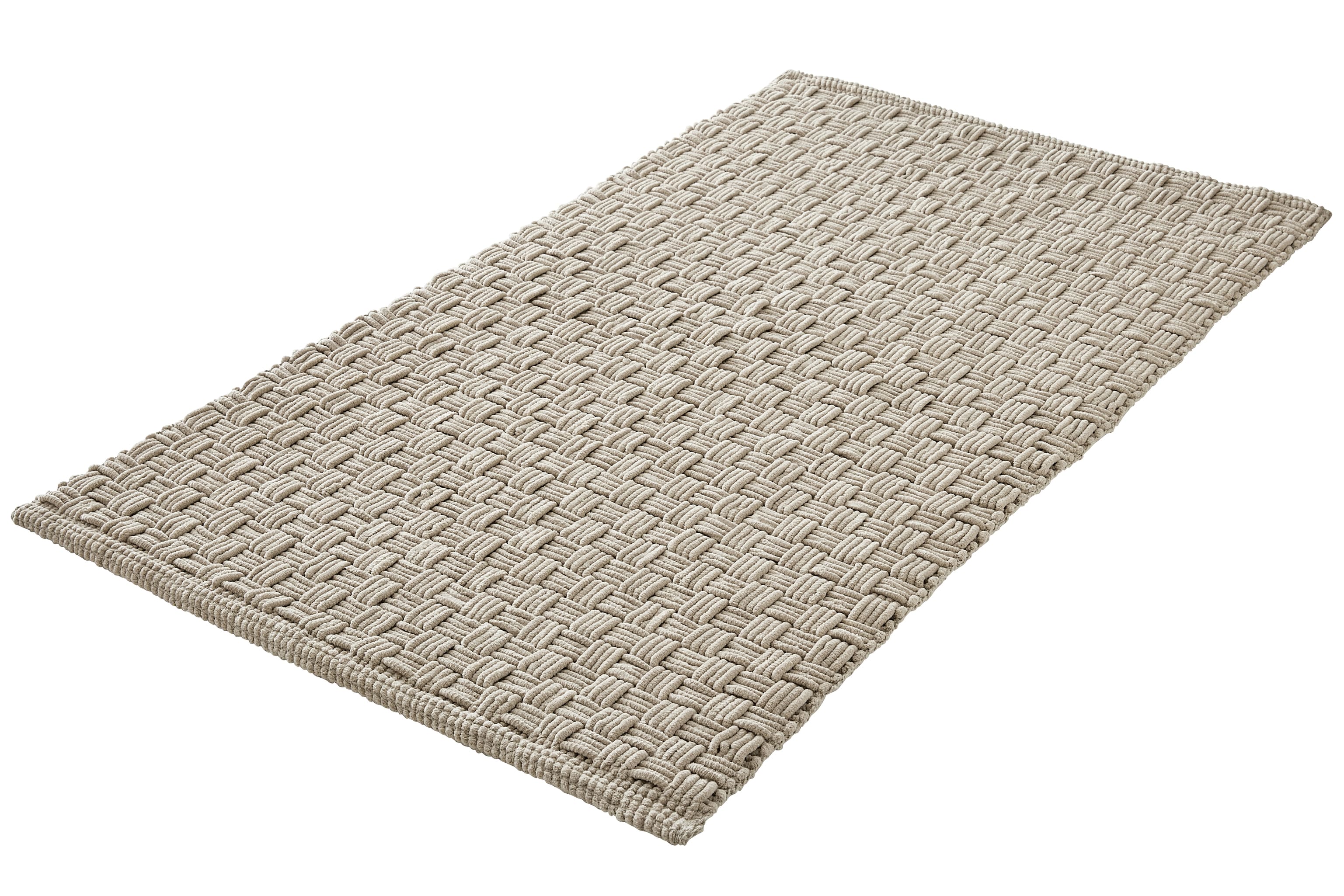 Beige Badematte mit geflochtenem Muster, rechteckig, weiche Textur, ideal für Badezimmer oder Wohnräume.